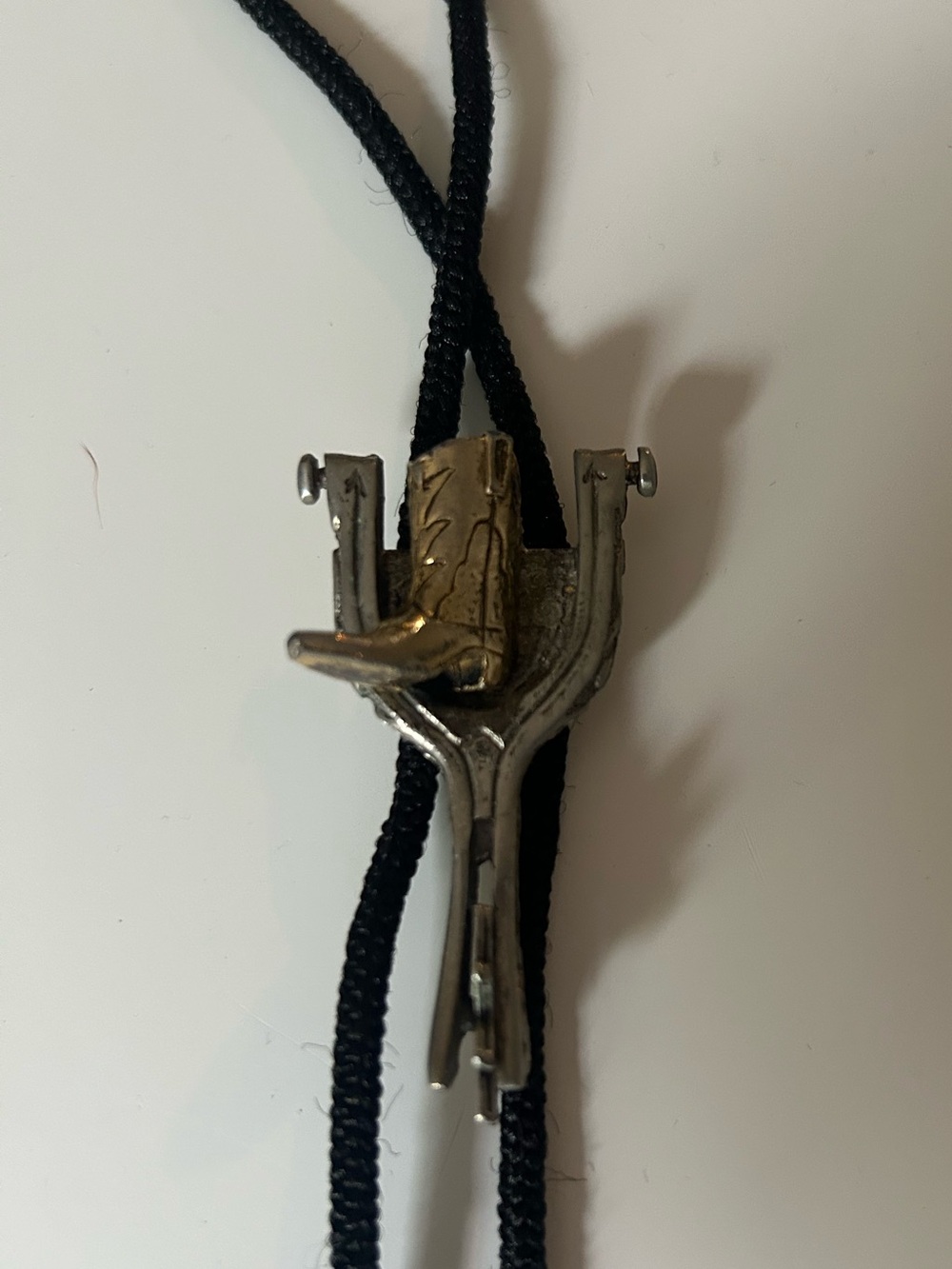 Black Bolo Tie with Silver and Gold Cowboy Boot  spur Accent